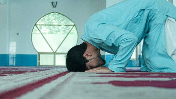 a person lying on a bed