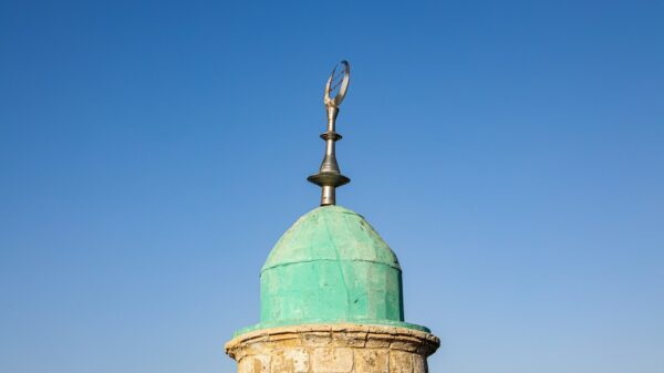 green and brown stone tower